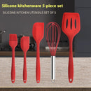 Silicone kitchenware 5-piece set in red featuring whisk, spatulas, and brush displayed in a modern kitchen setting