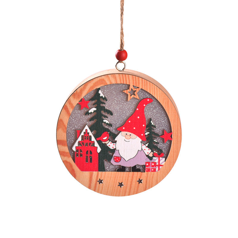 Round wooden New Christmas Tree Pendant with Santa in a red hat, holding gifts near a red house and pine trees under a starry sky.